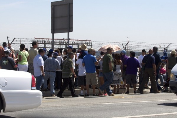 Some of the crowd standing on Aviation Boulevard waiting for a glimpse of the shuttle Some of the crowd standing on Aviation Boulevard waiting for a glimpse of the shuttle