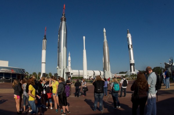 People still mingling just inside the Visitor's Complex in front of the rocket garden People still mingling just inside the Visitor's Complex in front of the rocket garden