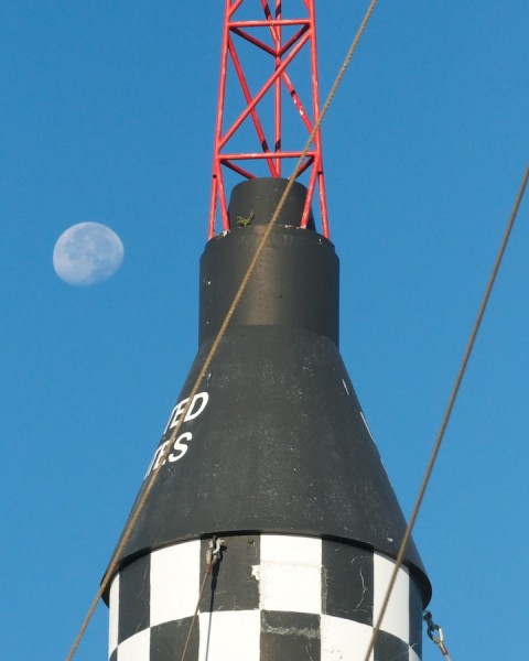 Space capsule with the moon in the background Space capsule with the moon in the background